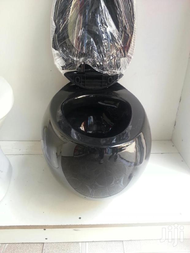 Black In Colour Concealed Toilets
