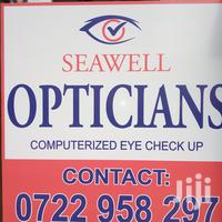 SEAWELL OPTICIANS logo