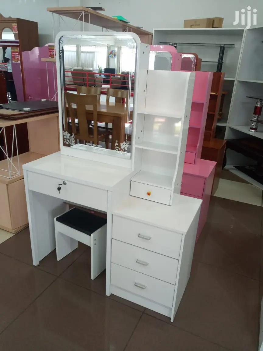 Dresser With a Sliding Mirror