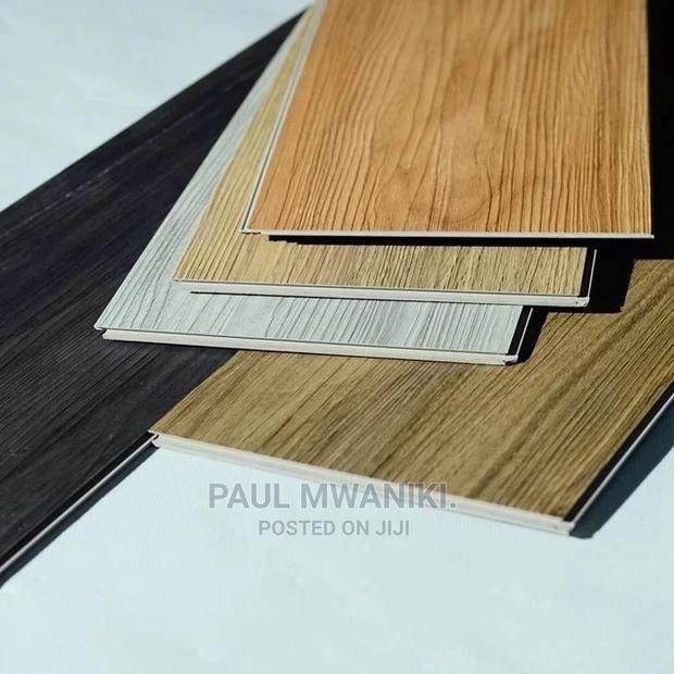 SPC Laminate PVC Vinyl Flooring, 100% Waterproof.