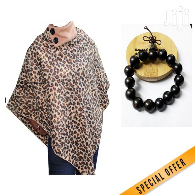 Ladies Animal Print Poncho With Wooden Bracelet