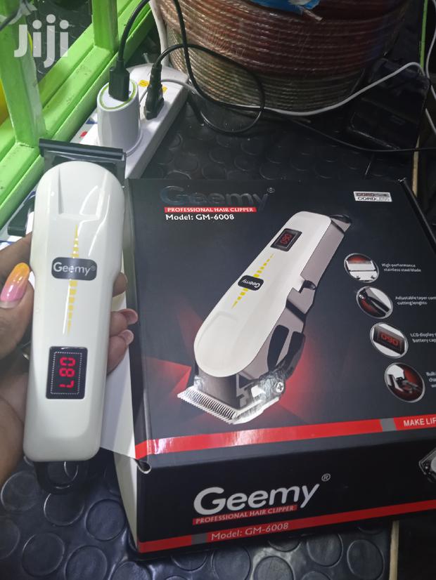 Geemy Proffessional Lcd Display Rechargeable Hair Clipper