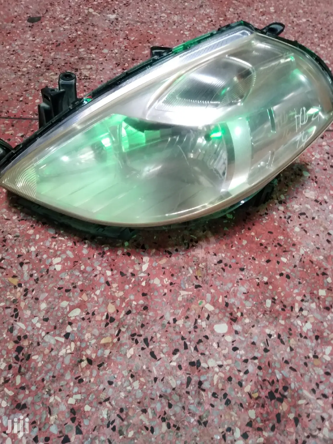 Nissan Tiida 2010 Model Headlights