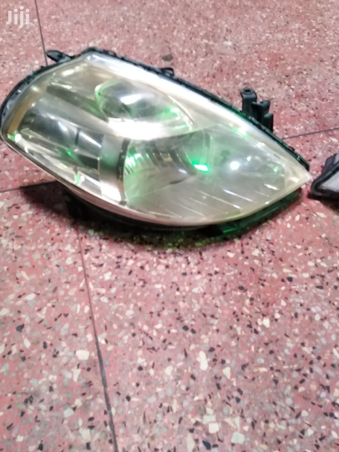 Nissan Tiida 2010 Model Headlights