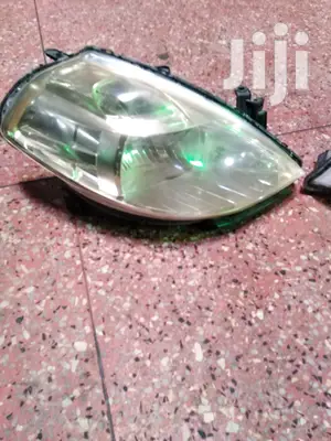 Nissan Tiida 2010 Model Headlights