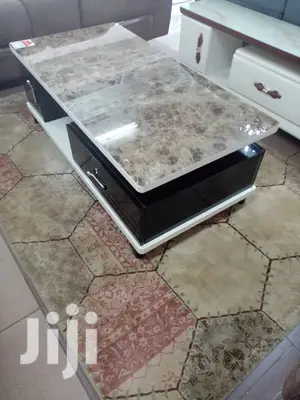 Elegant Coffee Table With Spacious Drawers