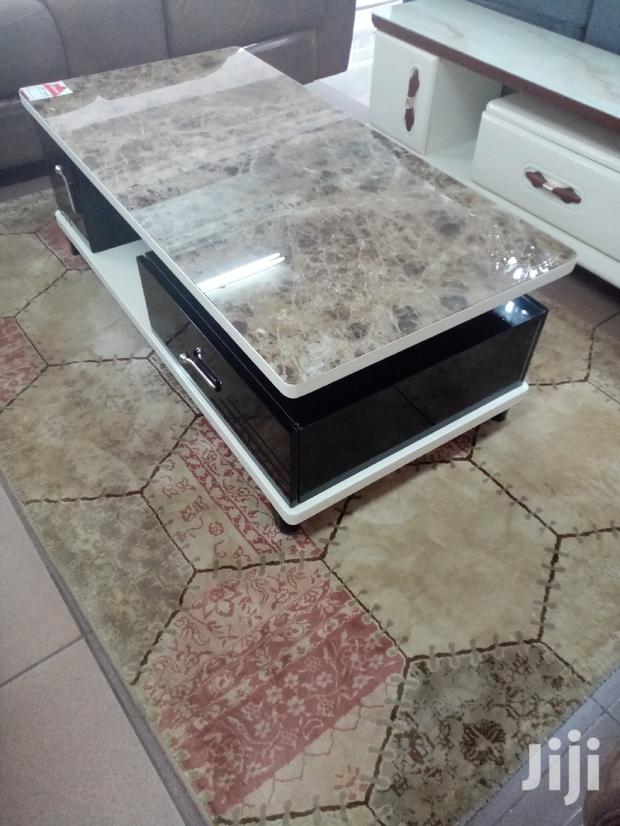 Elegant Coffee Table With Spacious Drawers