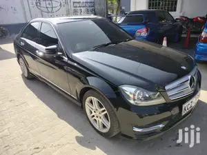 Pre-owned 2013 Mercedes-Benz C180 Black: Elegant Compact Car