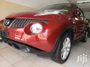 2014 Nissan Juke in Red: Elegant Compact SUV