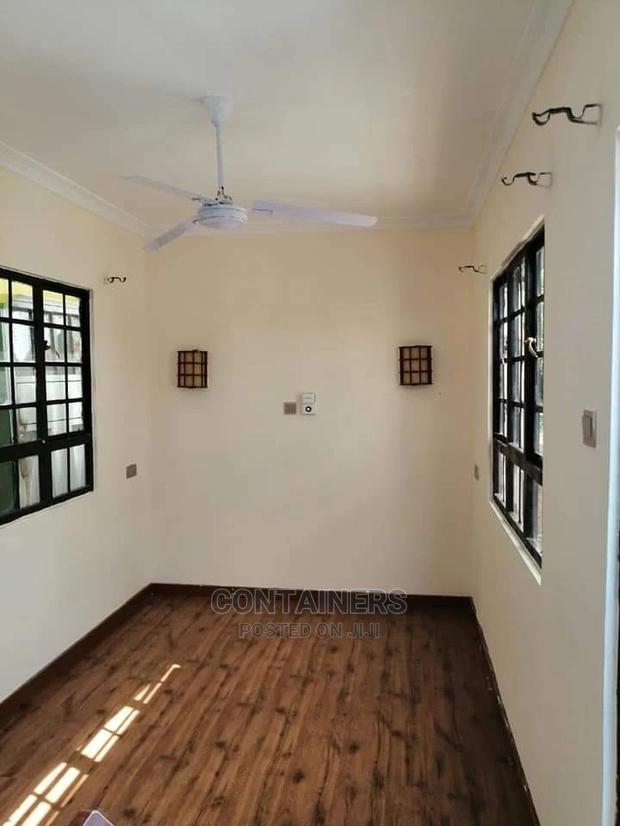 Shipping Container Into a Bedsitter - main view