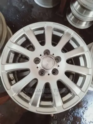 Original Rims Set Size 15 Inch 5 Holes.