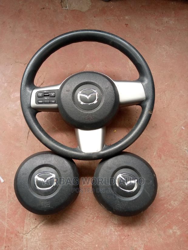 Complete and Airbag Mazda Demio - main view