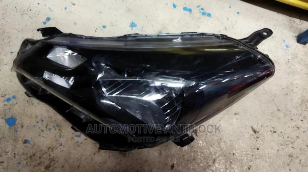 Vitz 2014 Headlights - main view