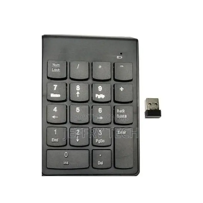 Calculator And A Small Wireless Numeric Keypad