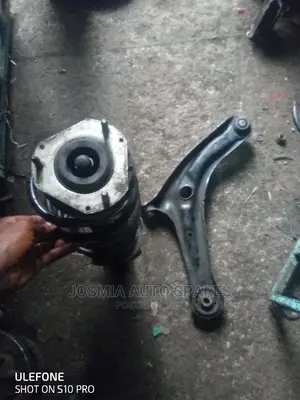 Mazda Demio Shock and Arm