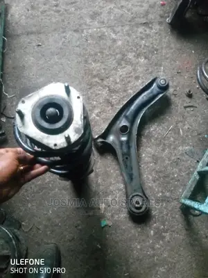 Mazda Demio Shock and Arm