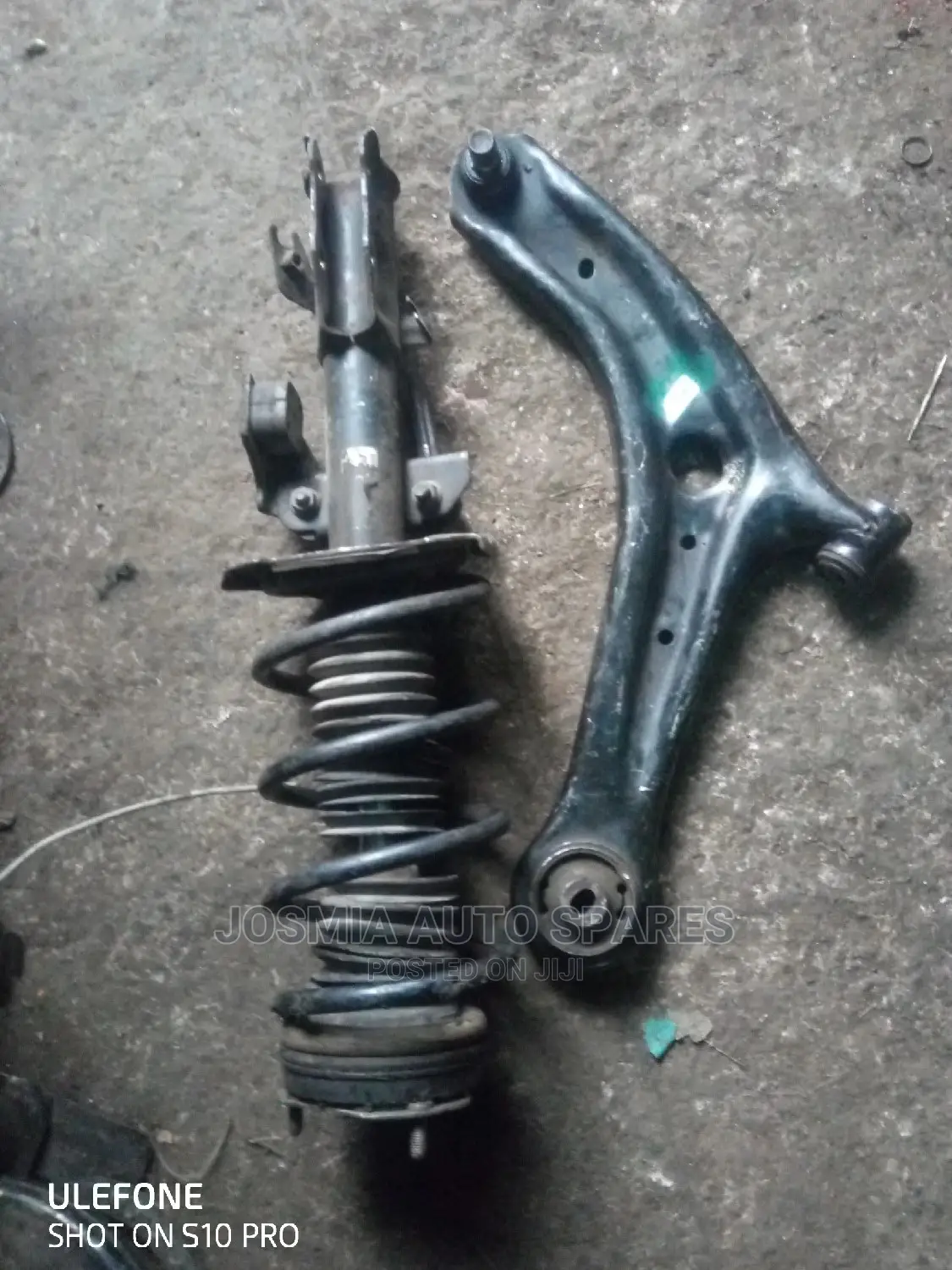 Mazda Demio Shock and Arm