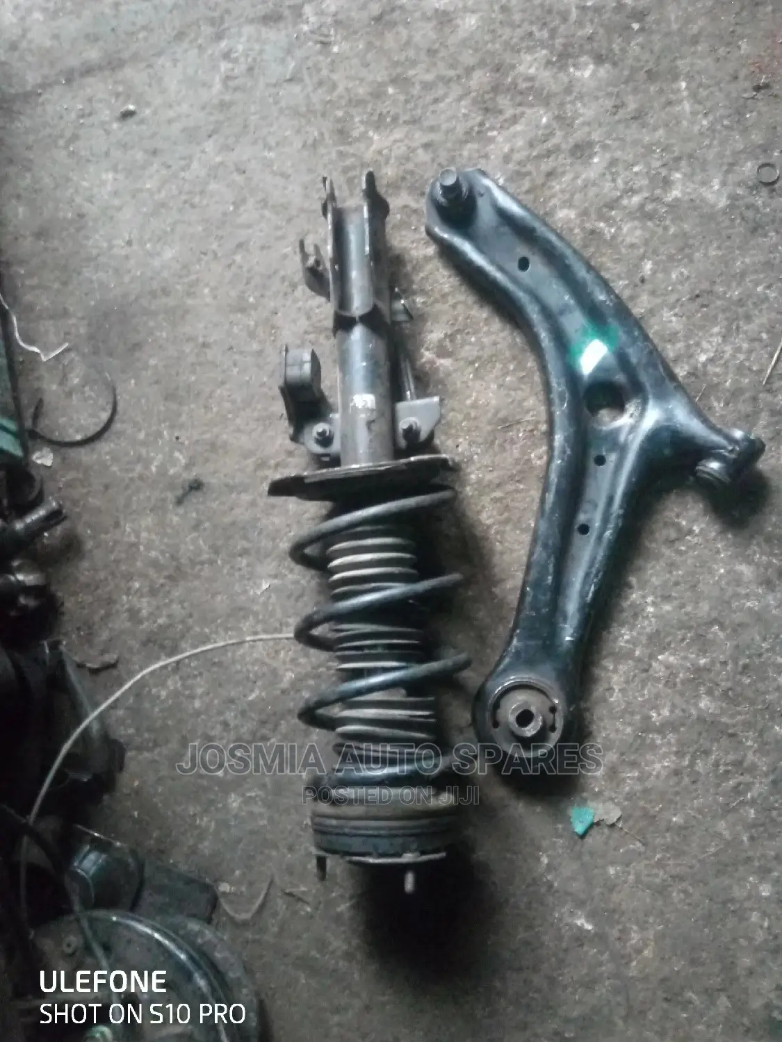 Mazda Demio Shock and Arm
