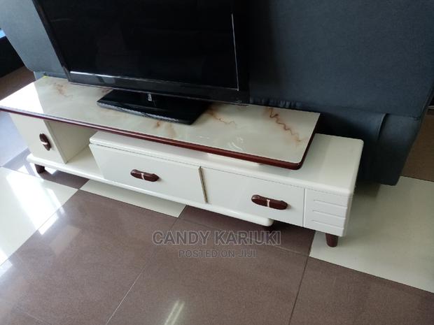 Extendable Glass Top TV Stand