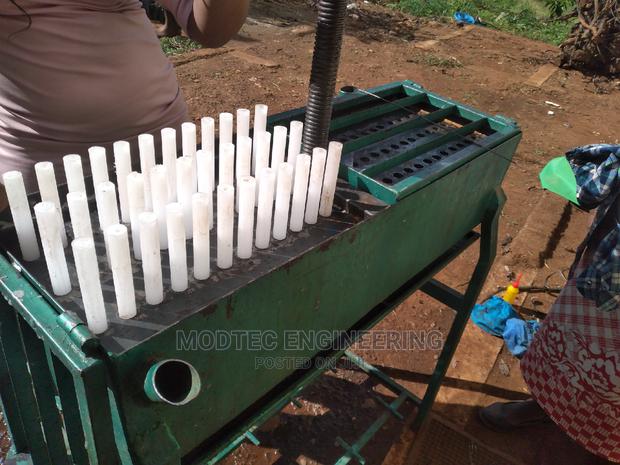 Modtec: Candle Making Machine