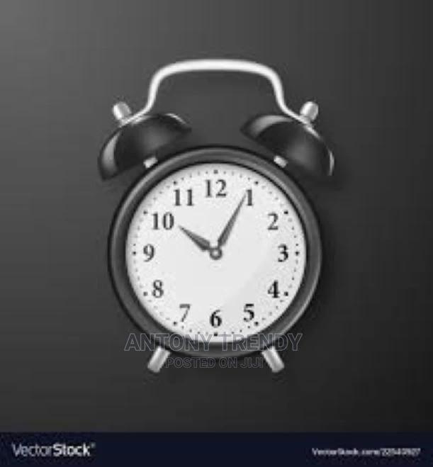 Vintage Alarm Clock on a Table Featuring Clock, Alarm,