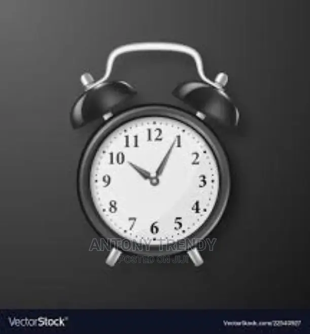 Vintage Alarm Clock on a Table Featuring Clock, Alarm,