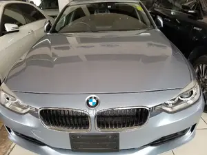 2014 Blue BMW 320i Sedan - Pre-owned