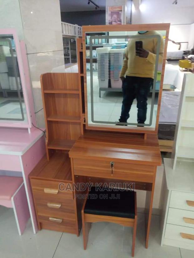 Brown Sliding Mirror Dresser