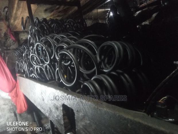 Lifting and Lowering Coil Springs - main view