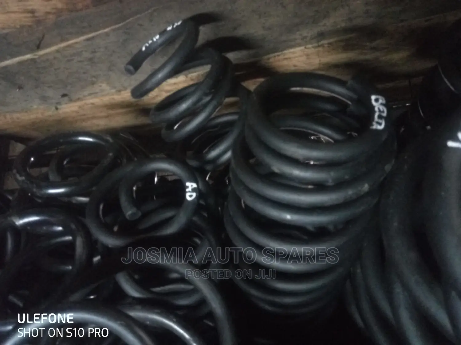Lifting and Lowering Coil Springs