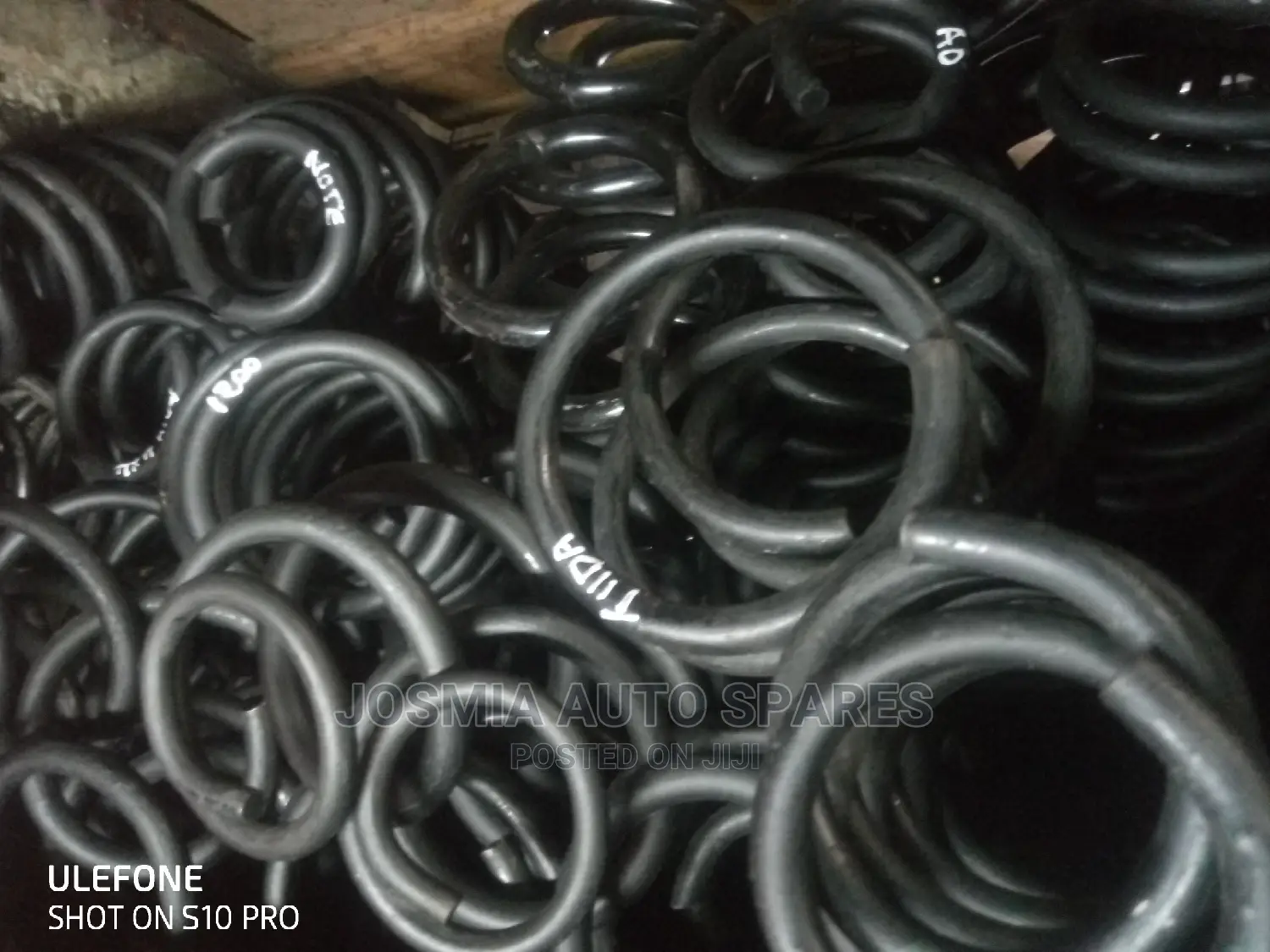 Lifting and Lowering Coil Springs