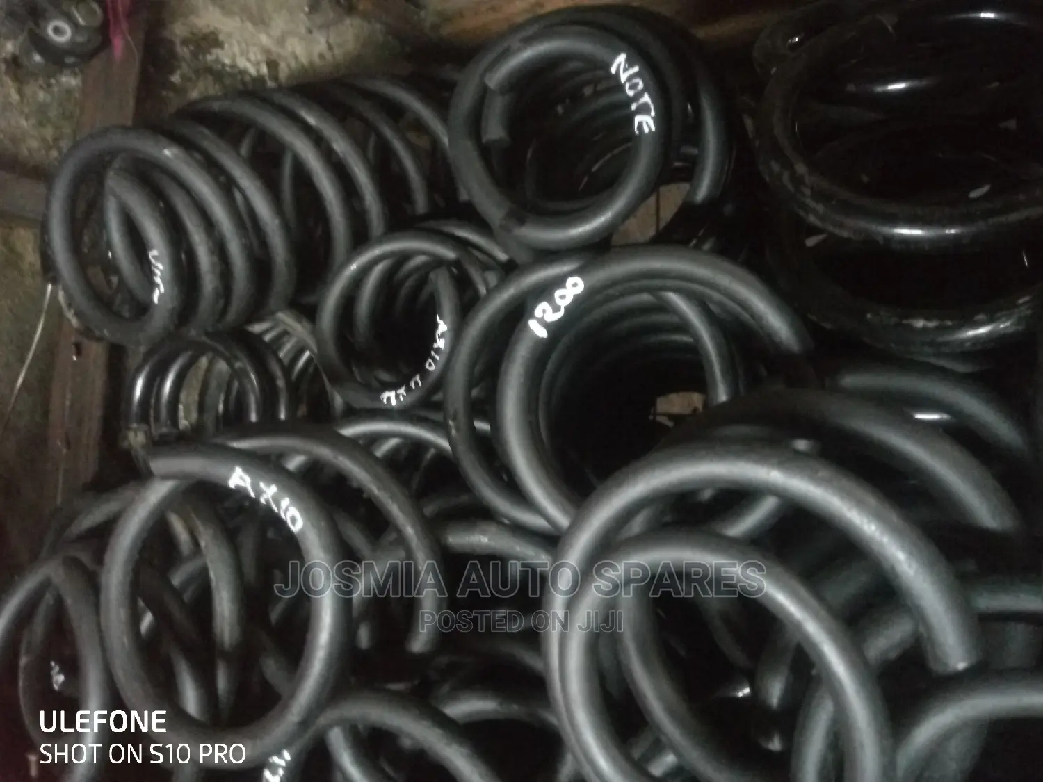 Lifting and Lowering Coil Springs