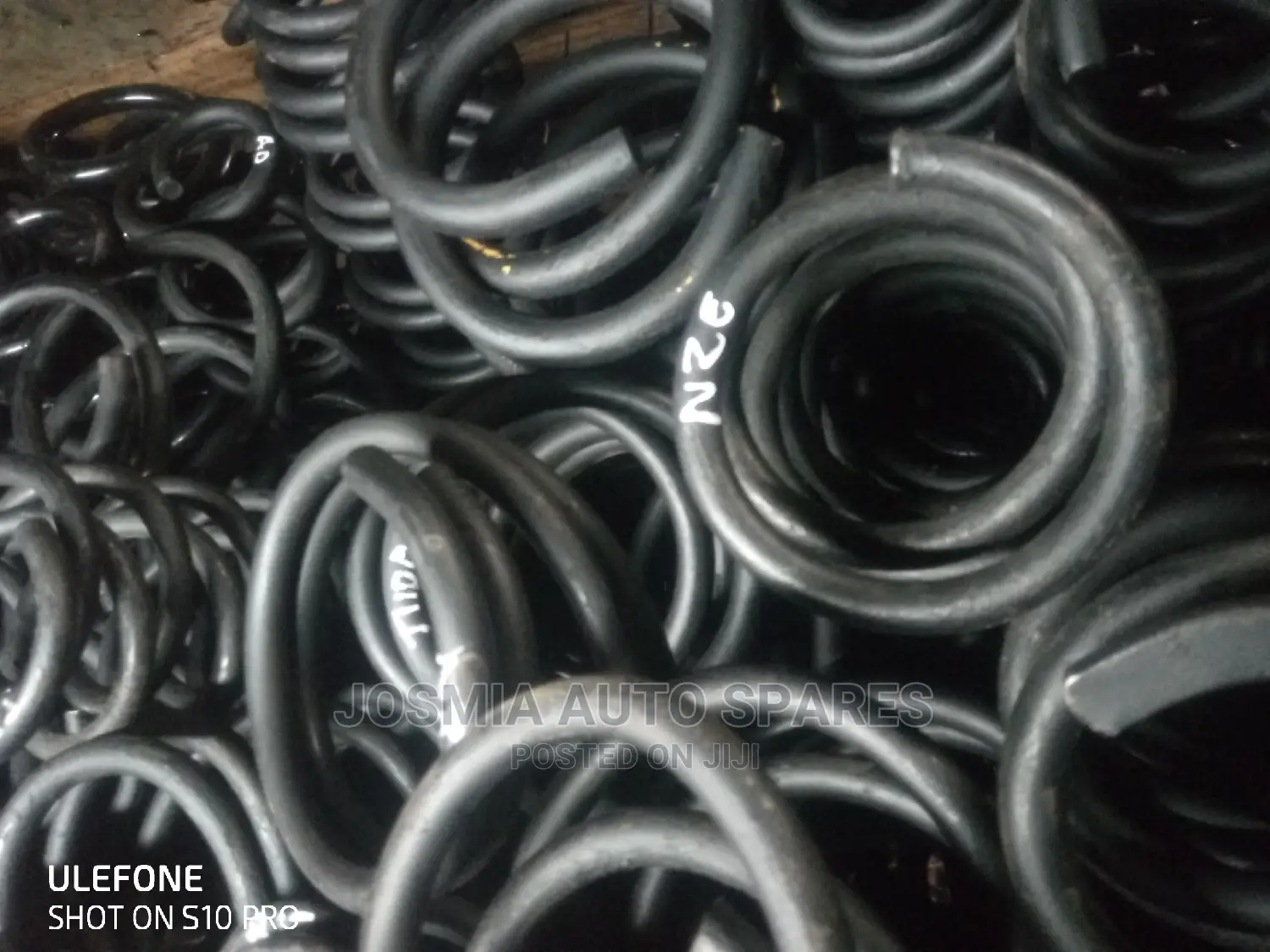 Lifting and Lowering Coil Springs