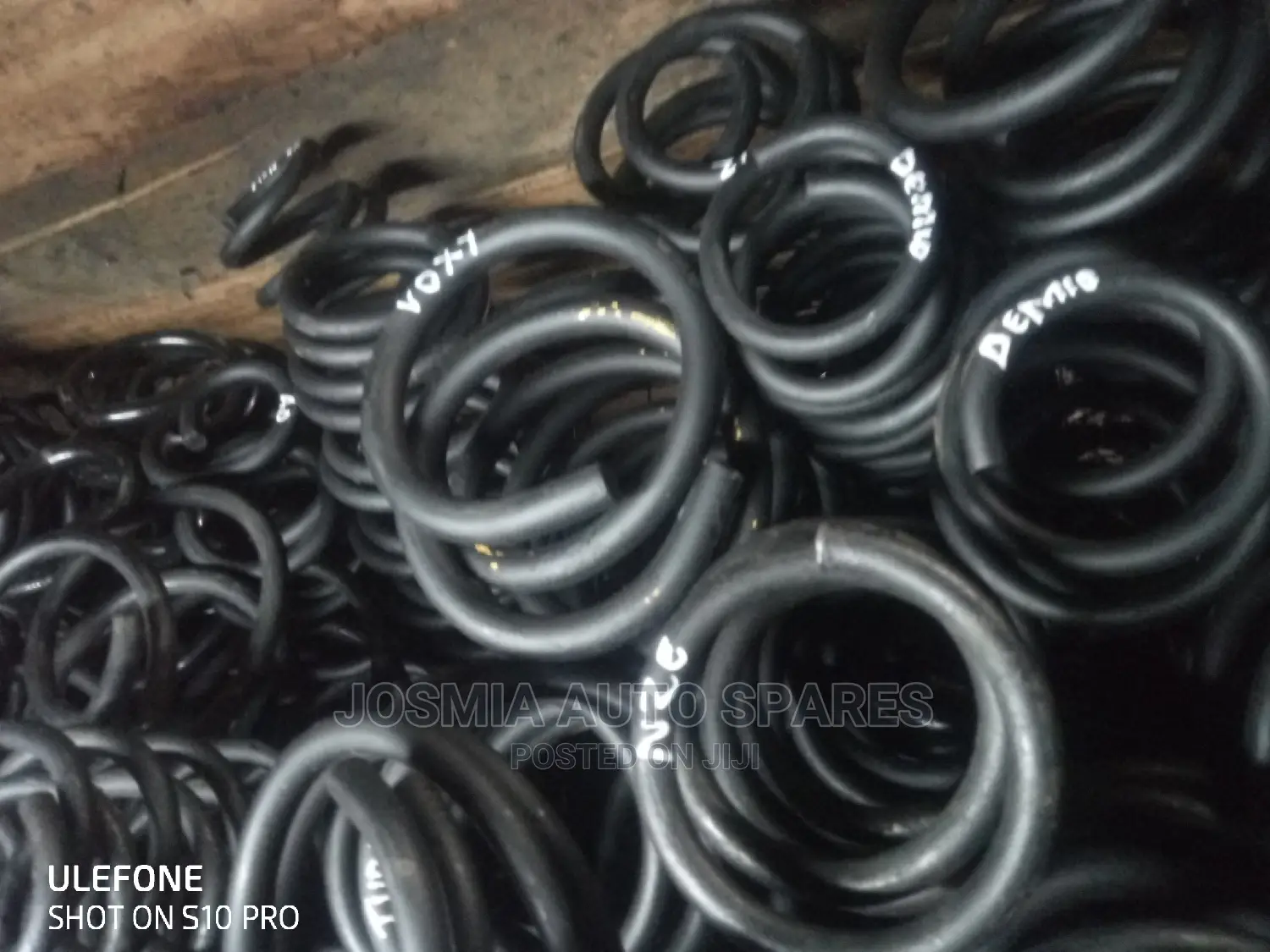 Lifting and Lowering Coil Springs