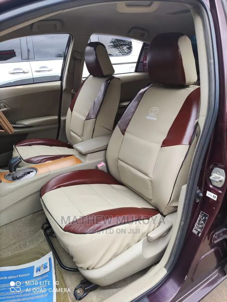Beige / Maroon Interior Car Seat Covers.