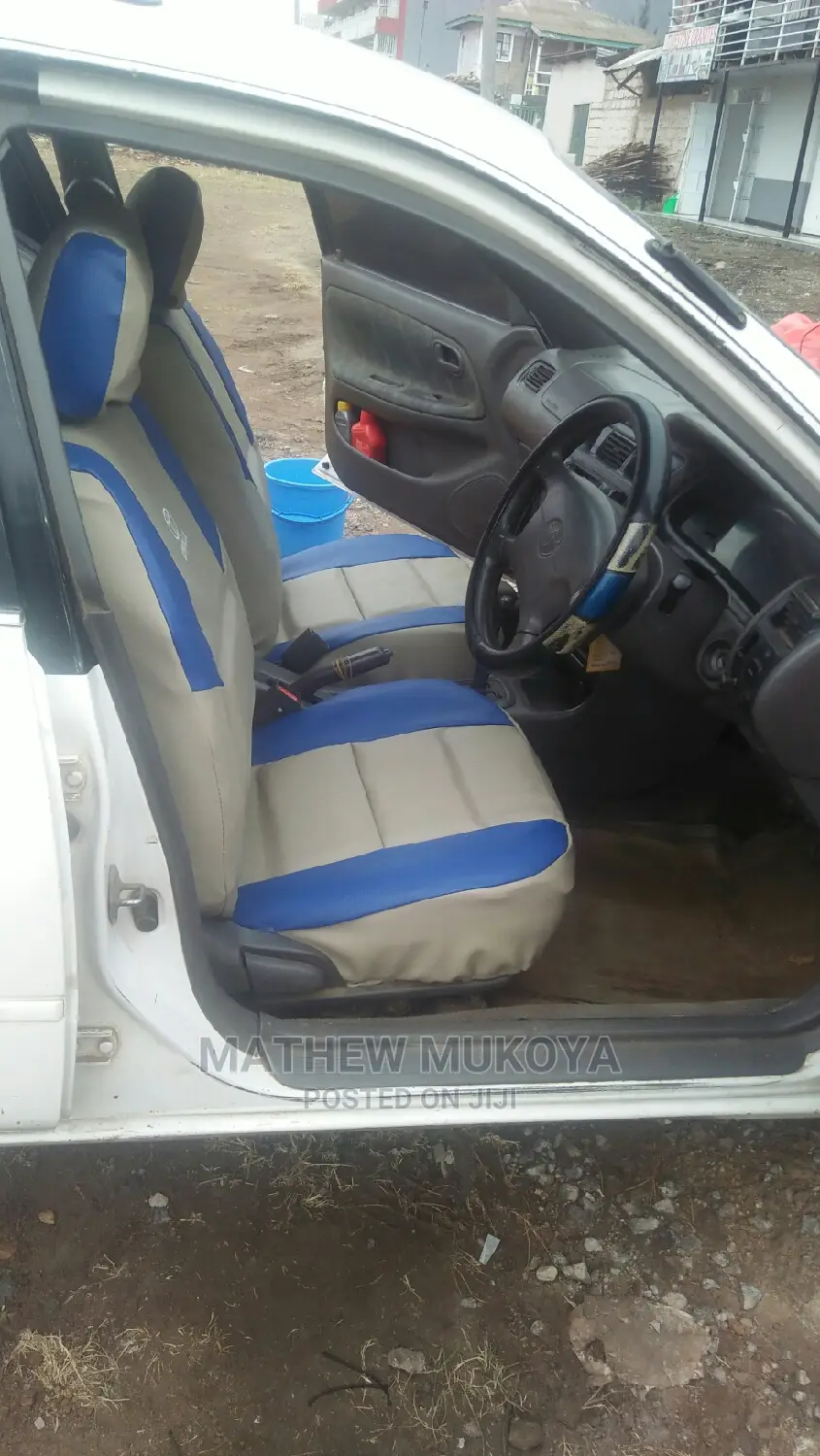 L. Touring Car Seat Covers