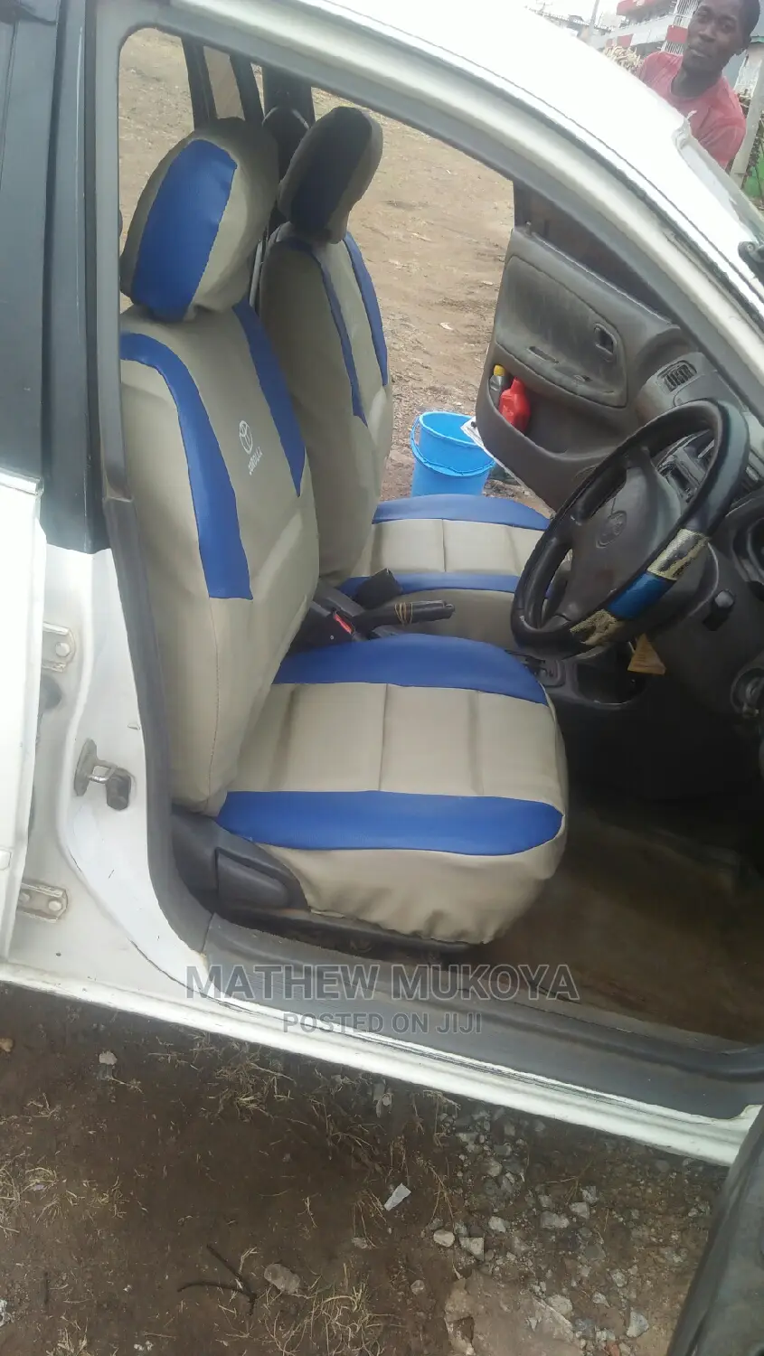 L. Touring Car Seat Covers