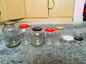 A Box of 24 720ml Glass Jars With Airtight Lids