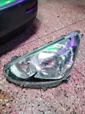 Mitsubishi Mirage Left Headlight Assembly