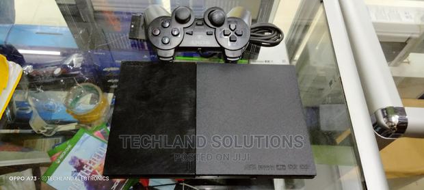 Playstation 2 . ( Ps2)