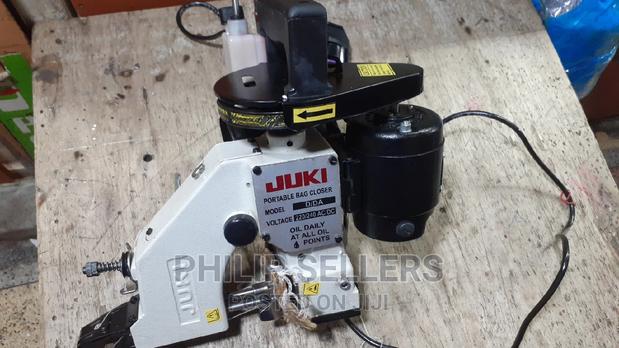 New Bag Closing Machine - main view