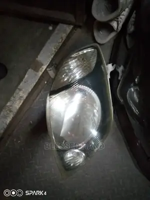 Headlamp Toyota NZE/Fielder 2002