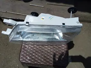 Nissan Sentra Series 3 B14 Headlight (TYC)