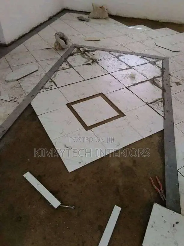 Tiles Laying and S.P.C Instalation