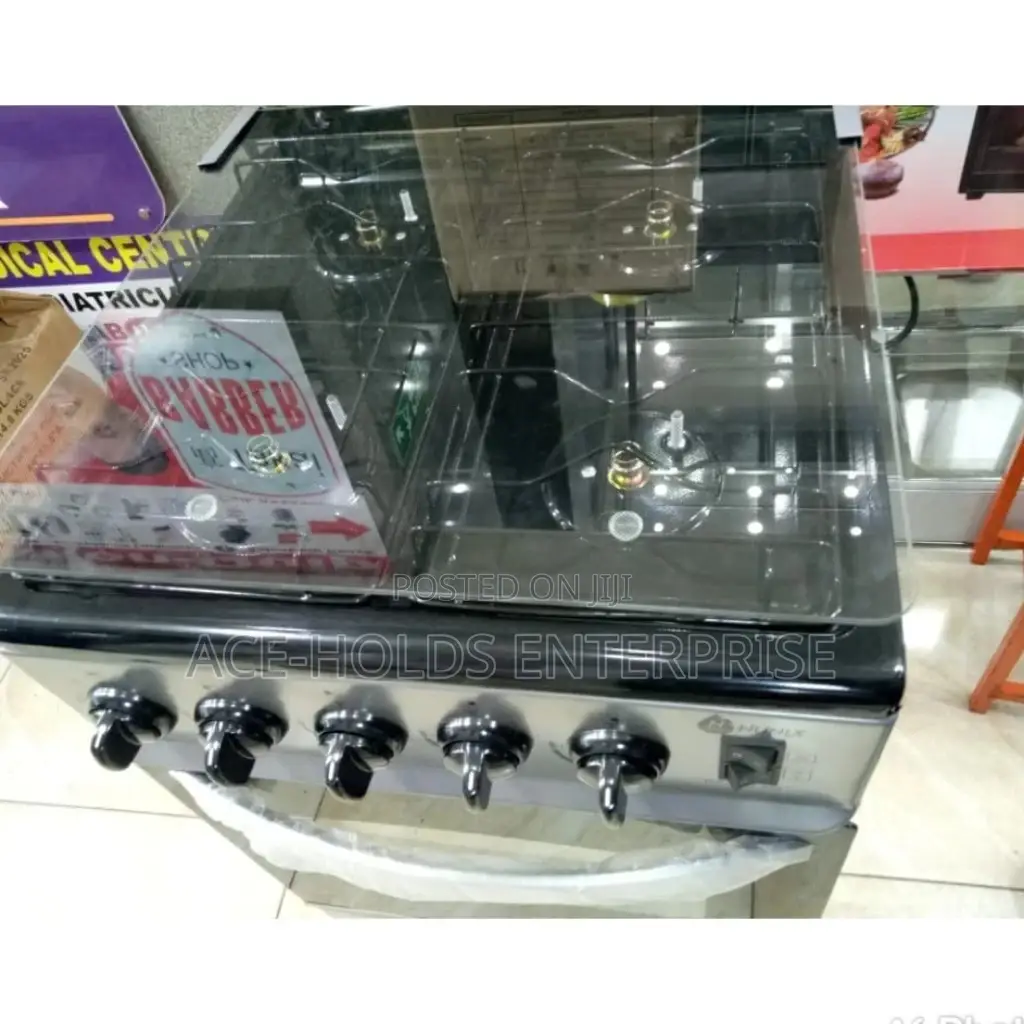 4 Gas Nunix Standing Oven Cooker With Electric Oven.