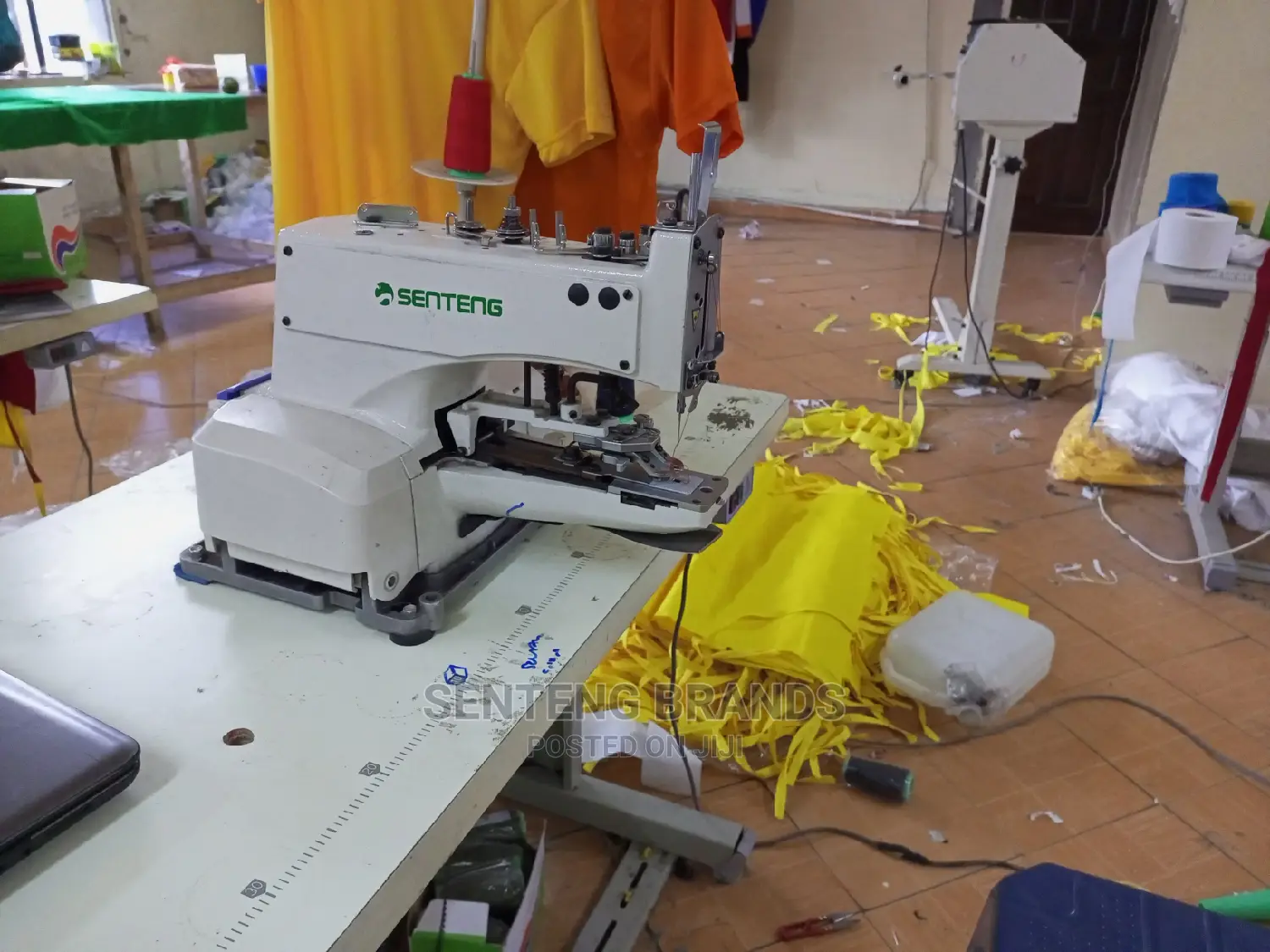 Button Attacking Sewing Machine
