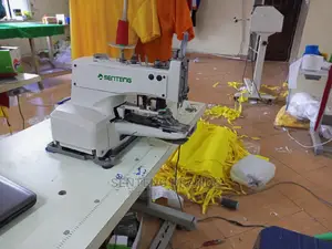 Button Attacking Sewing Machine
