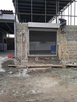 Roller Shutter Door Grill Installation. - main view