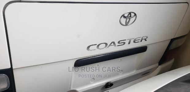 Toyota Coaster 2015 White - thumbnail 4
