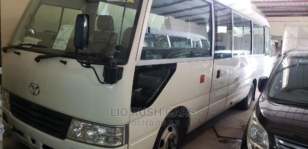 Toyota Coaster 2015 White - main view
